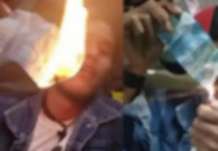 Viral Video Pria Bakar Uang Kertas, Pelaku Bisa Saja Terancam 5 Tahun Penjara dan Denda Rp1 Miliar