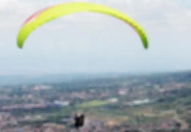 Sedang Mudik ke Malang? Yuk, Melihat Kota Batu dengan Paralayang dan Paculah Adrenalin Anda