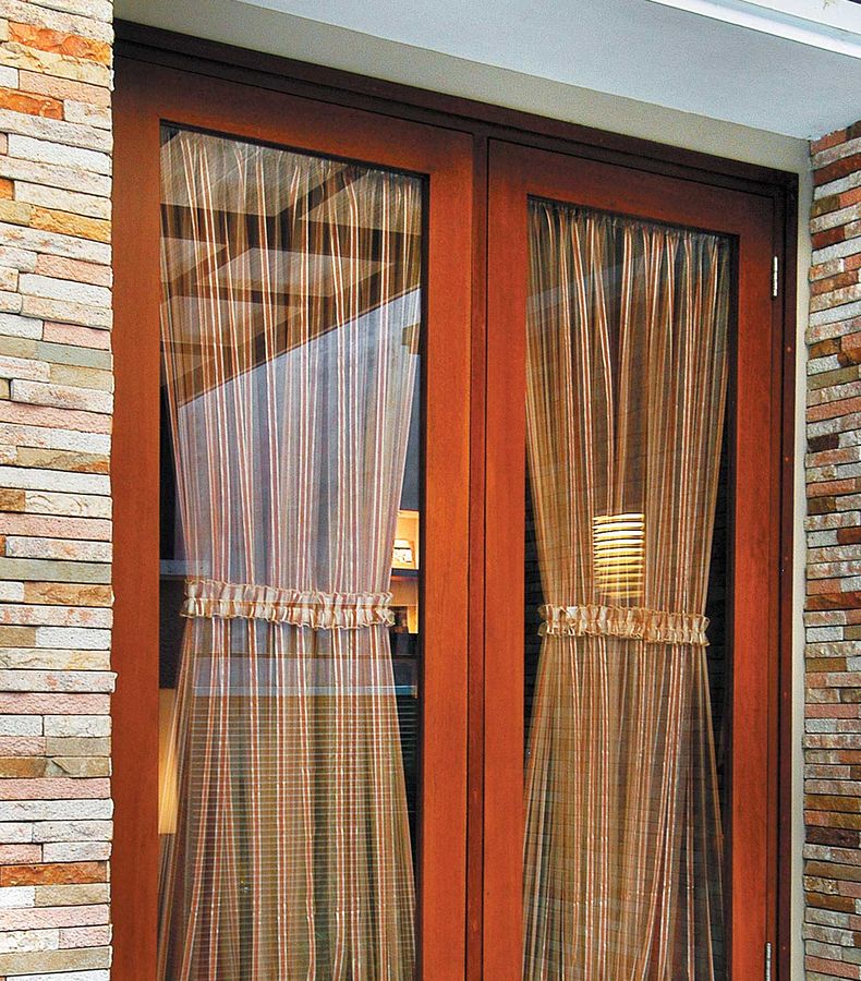 Komposisi Batu Alam Pada Fasad