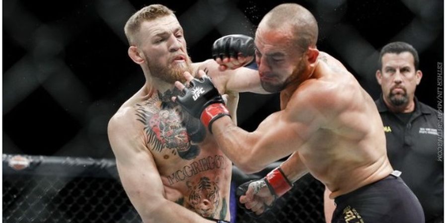 SEJARAH HARI INI - Keduluan Rival Kesumat, Khabib Cuma Bisa Lihat Conor McGregor Jadi Juara Kelas Ringan UFC