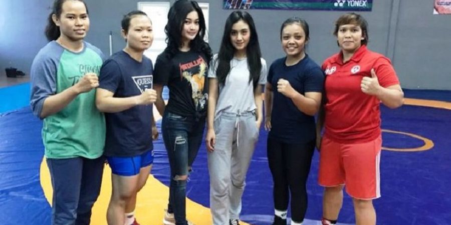 Olahraga Gulat di Asian Games yang Digambarkan di Atas Perangko