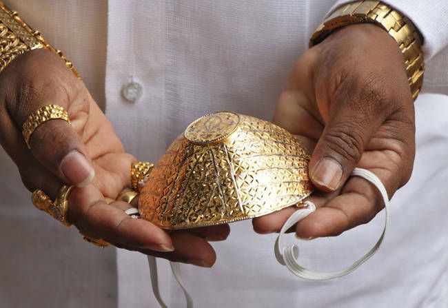 Jam tangan emas 24 karat