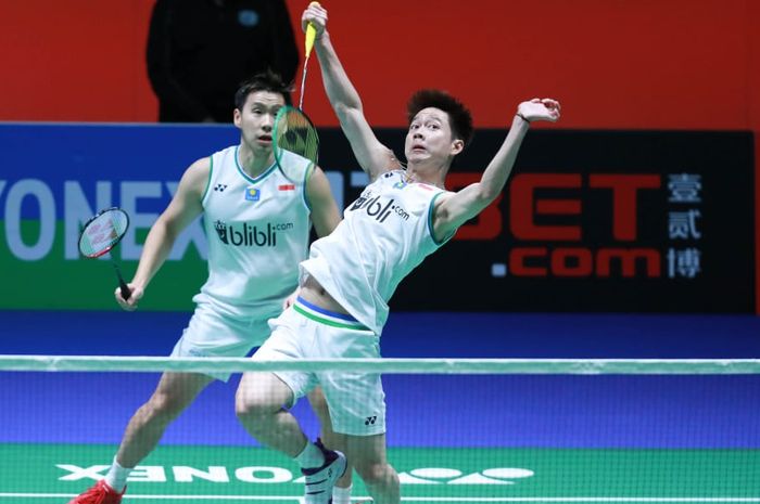 Pasangan ganda putra Indonesia, Marcus Fernaldi Gideon/Kevin Sanjaya Sukamuljo, pada perempat final All England Open 2020 di Arena Birmingham, Inggris, Jumat (13/3/2020).