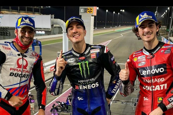 Maverick Vinales (tengah) berhasil menjadi juara MotoGP Qatar 2021 (28/03/2021)
