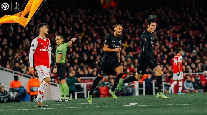 Pemain Eintracht Frankfurt, Daichi Kamada, merayakan golnya ke gawang Arsenal dalam laga Liga Europa di Emirates Stadium, Kamis (28/11/2019).