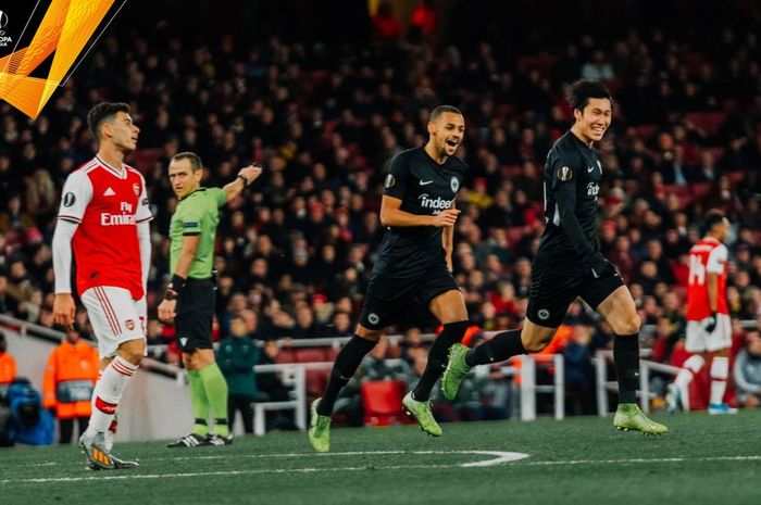 Pemain Eintracht Frankfurt, Daichi Kamada, merayakan golnya ke gawang Arsenal dalam laga Liga Europa di Emirates Stadium, Kamis (28/11/2019).
