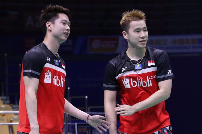 Pasangan ganda putra Indonesia, Marcus Fernaldi Gideon/Kevin Sanjaya Sukamuljo, saat berlaga pada babak kedua Kejuaraan Asia (Badminton Asia Championships) 2019, di Wuhan Sports Center Gymnasium, Wuhan, Hubei, China, Kamis (25/4/2019).