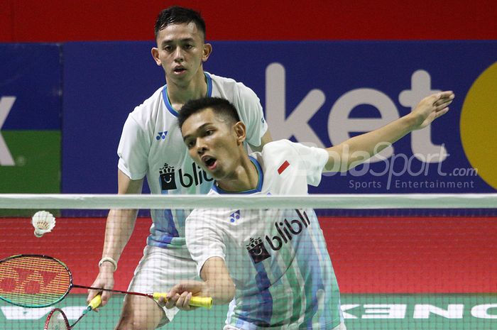 Pasangan ganda putra Indonesia, Fajar Alfian/Muhammad Rian Ardianto, saat bertanding melawan wakil China, Huang Kaixiang/Liu Cheng, pada babak kesatu Indonesia Open 2019 di Senayan, Jakarta, Selasa (17/7/2019).