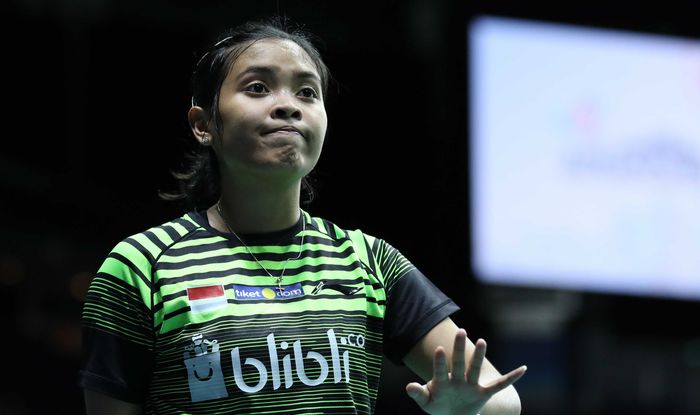 Pebulu tangkis tunggal putri Indonesia, Gregoria Mariska Tunjung, bereaksi saat tengah menjalani laga melawan Mia Blichfeldt (Denmark) pada babak kesatu Singapore Open 2019.