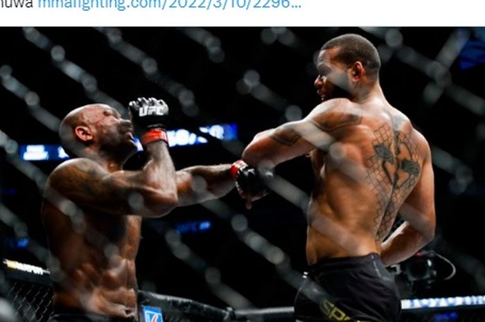 Thiago Santos (kanan) saat melawan Jimi Manuwa pada UFC 231 (9/12/2018).