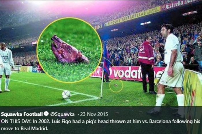 Gelandang Real Madrid, Luis Figo, saat mendapat lemparan kepa babi dari suporter Barcelona di Camp Nou.