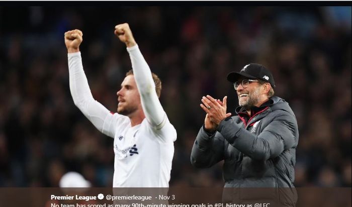 Juergen Klopp (kanan) dan Jordan Henderson merayakan kemenangan Liverpool.