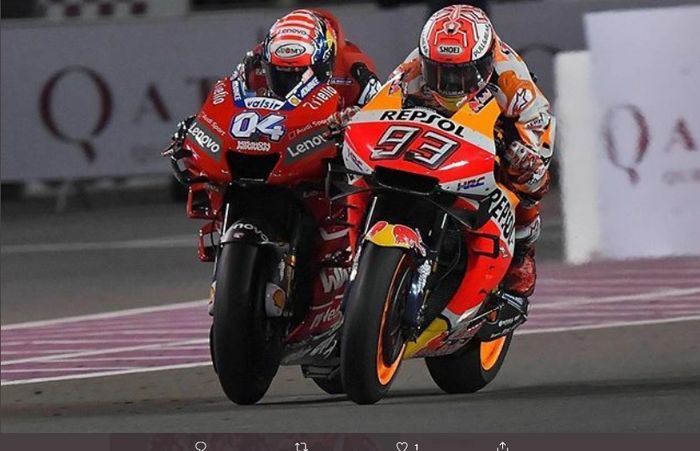 Andrea Dovizioso (4) dan Marc Marquez (93) dalam sebuah perlombaan.