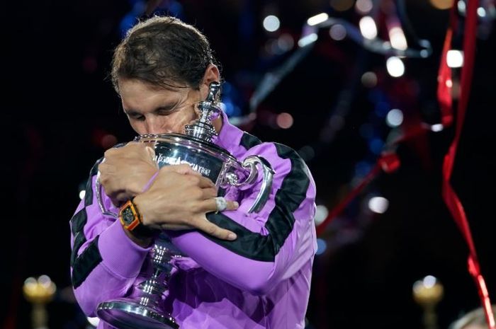 Ekspresi hari petenis Spanyol, Rafael Nadal, usai memastikan gelar juara US Open 2019 Senin (9/9/2019) pagi WIB.