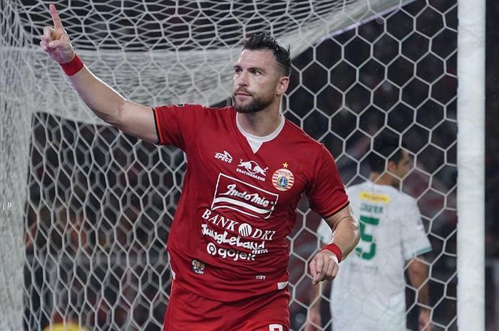 Striker Persija Jakarta, Marko Simic, merayakan golnya ke gawang Persebaya Surabaya dalam laga pekan ke-33 di Stadion Utama Gelora Bung Karno (SUGBK), Jakarta Utara, Selasa (17/12/2019).