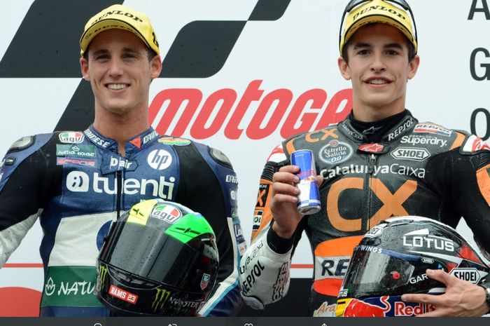 Pol Espargaro (kiri) dan Marc Marquez (kanan) akan bertandem dalam satu tim di Repsol Honda pada MotoGP 2021.