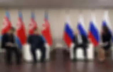 Vladimir Putin dan Kim Jong Un.