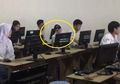 Kocak! Brightness PC Nggak Bisa Diatur, Siswi Ini Kerjain UNBK Pakai Kacamata Hitam