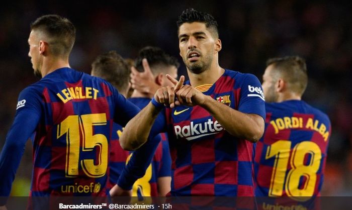 Selebrasi Luis Suarez usai mencetak gol keduanya pada pertandingan Barcelona kontra Valencia dalam lanjutan Liga Spanyol, Sabtu (14/9/2019).