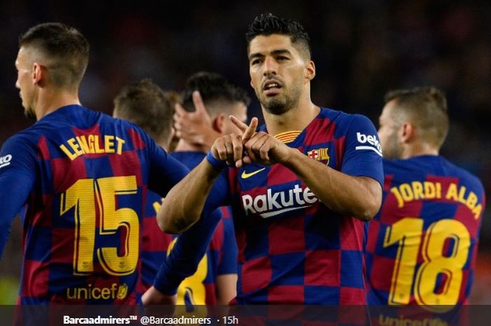 Selebrasi Luis Suarez usai mencetak gol keduanya pada pertandingan Barcelona kontra Valencia dalam lanjutan Liga Spanyol, Sabtu (14/9/2019).