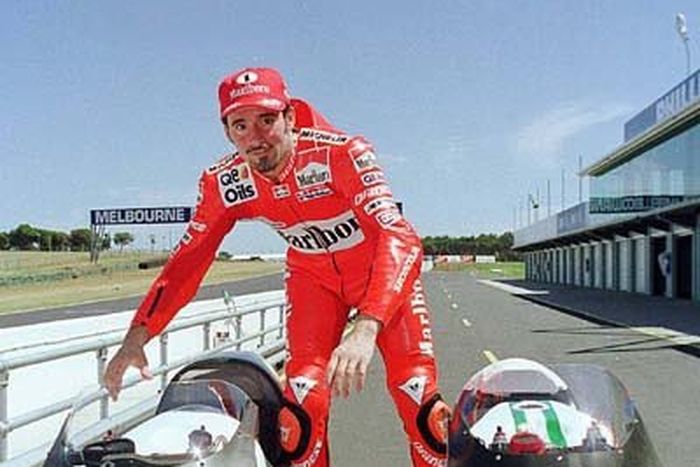 Max Biaggi, komentari kisruh kemenangan Ducati di MotoGP Qatar.