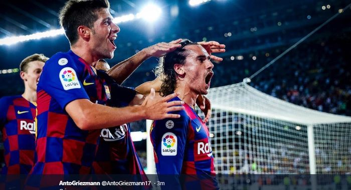 Para pemain Barcelona turut merayakan gol kedua yang dicetak oleh Antoine Griezmann kala menjebol gawang Real Betis di Stadion Camp Nou pada pertandingan pekan kedua LIga Spanyol 2019-2020, Minggu (25/8/2019).