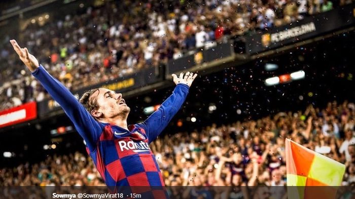 Antoine Griezmann melakukan selebrasi setelah sukses menyarangkan gol keduanya pada pertandingan Barcelona melawan Real Betis di Stadion Camp Nou pada pekan kedua Liga Spanyol 2019-2020, Minggu (25/8/2019).