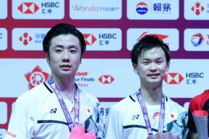 Pasangan ganda putra Indonesia, Mohammad Ahsan/Hendra Setiawan berhasil meraih gelar ketiganya dalam BWF World Tour Finals 2019 setelah menumbangkan Hiroyuki Endo/Yuta Watanabe (Jepang) di Tianhe Gymnasium, Guangzhou, China, Minggu (15/12/2019).