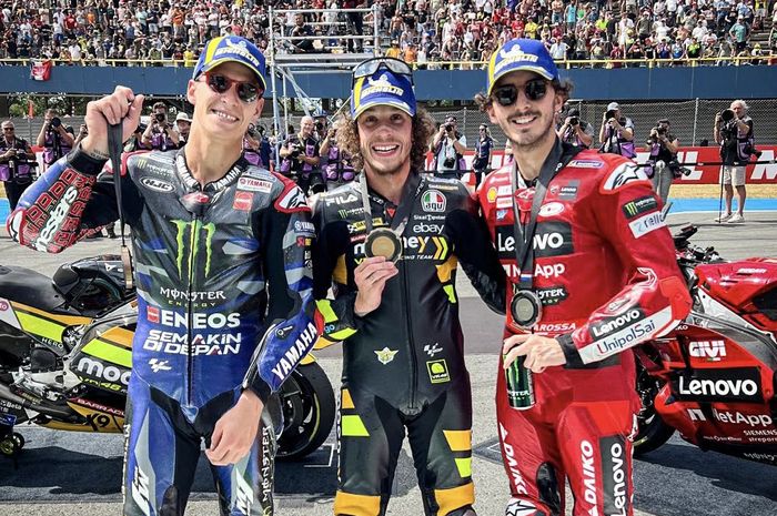 (Ki-ka) Fabio Quartararo, Marco Bezzecchi, dan Francesco Bagnaia merayakan hasil podium dari sprint MotoGP Belanda di Sirkuit Assen, Belanda, 24 Juni 2023.  