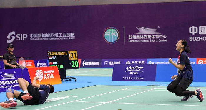 Momen saat Leo Rolly Carnando/Indah Cahya Sari Jamil meraih poin kemenangan pada final Kejuaraan Asia Junior 2019, di Suzhou Olympic Sports Centre, Suzhou, China, Minggu (28/7/2019).