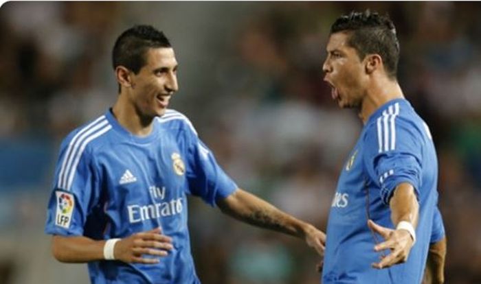 Angel Di Maria (kiri), melakukan selebrasi bersama Cristiano Ronaldo saat masih memperkuat Real Madrid