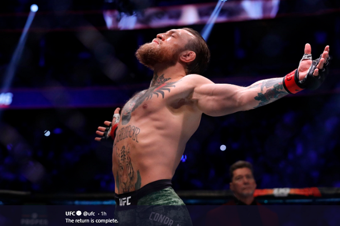 Selebrasi Conor McGregor usai menang dalam waktu 40 detik lawan Donald Cerrone pada UFC 246 di T-Mobile Arena, Las Vegas, Minggu (19/1/2020). 