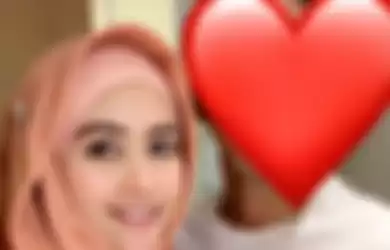 Meggy Wulandari dan suami barunya