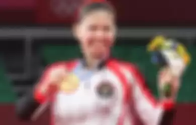 Greysia Polii berhasil menyumbang emas untuk Indonesia bersama Apriyani Rahayu.