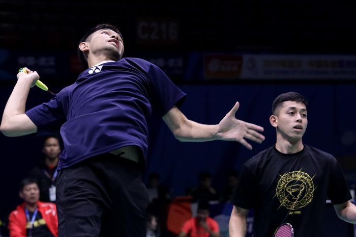 Fajar Alfian/Muhammad Rian Ardianto saat menjalani sesi latihan di Wuhan Sports Center Gymnasium, Wuhan, China, Senin (22/4/2019).