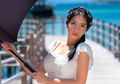 Pamer Lekuk Tubuh Sambil Nyeker Saat di Pantai, Tampilan Janda Seksi Angel Karamoy Pakai Dress Super Ketat Tuai Komentar Netizen