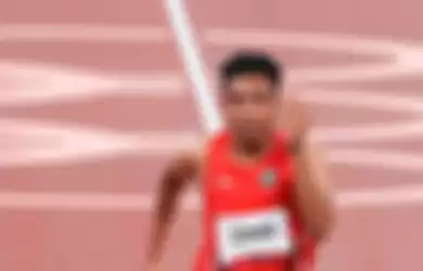 Sprinter Indonesia, Lalu Muhammad Zohri, saat tampil pada babak utama 100m putra cabang olahraga atletik, di Olympic Stadium, Tokyo, Sabtu (31/7/2021).