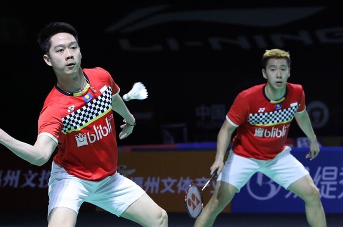 Pasangan ganda putra Indonesia, Marcus Fernaldi Gideon/Kevin Sanjaya Sukamuljo, tampil pada babak pertama Fuzhou China Open 2019 di Haixia Olympic Sports Center, Selasa (5/11/2019).