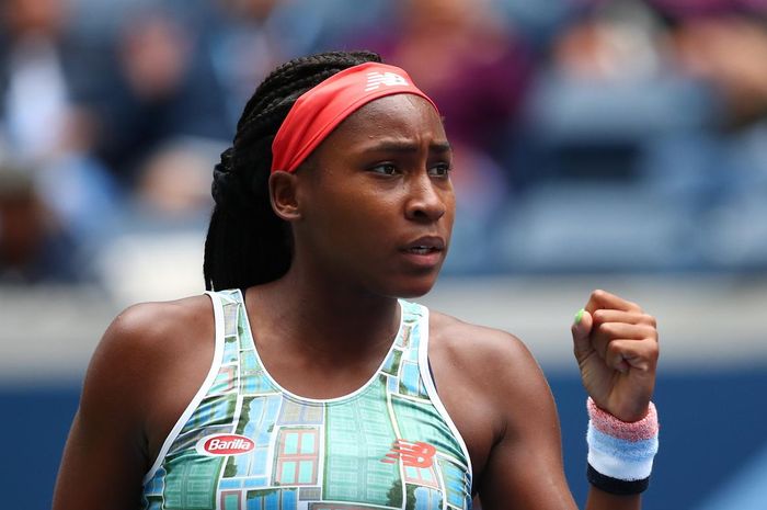 Petenis putri Amerika Serikat (AS), Coco Gauff, melakukan selebrasi seusai memenangi poin pada pertandingan babak kesatu US Open 2019 di Flushing Meadows, New York, Amerika Serikat.