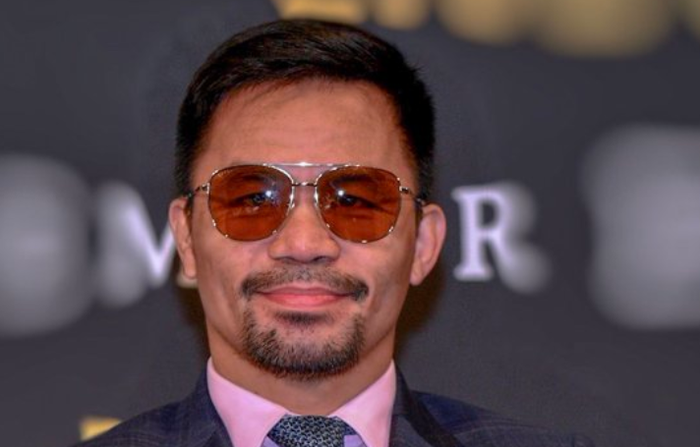 Petinju kelas welter, Manny Pacquiao. Sebagai petinju, dia juga menjabat Senator Filipina.