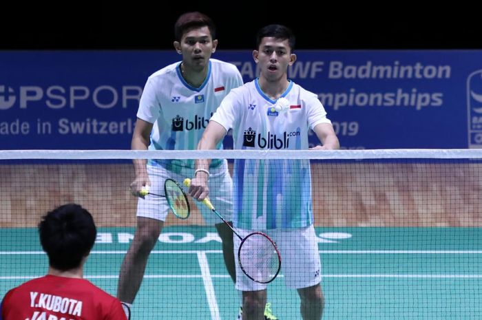 Pasangan ganda putra Indonesia, Fajar Alfian/Muhammad Rian Ardianto, saat bertanding pada babak pertama Swiss Open 2019, Rabu (13/3/2019).