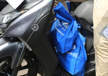 Kendarai Motor Matik Sambil Bawa Barang, Ini Tips Aman dari Yamaha
