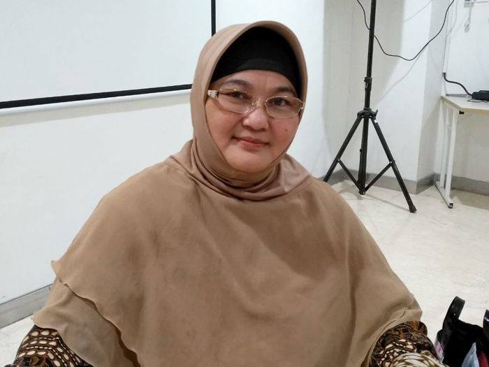 Dr. dr. Erlina Burhan, SpP(K), MSc