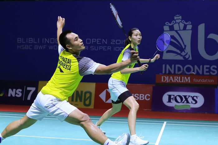 Pasangan ganda campuran Indonesia, Hafiz Faizal/Gloria Emanuelle Widjaja, menjalani laga babak kedua Indonesia Open 2019 di Istora Senayan, Jakarta, Kamis (18/7/2019).