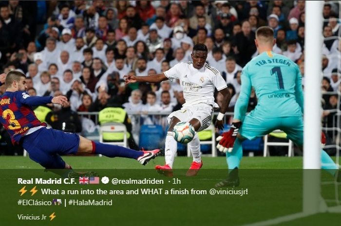 Penyerang Real Madrid, Vinicius Junior, mencetak gol ke gawang Barcelona dalam laga Liga Spanyol di Stadion Santiago Bernabeu, Minggu (1/3/2020).