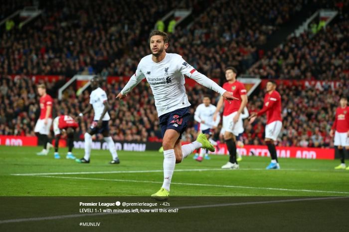 Selebrasi Adam Lallana usai mencetak gol ke gawang Manchester United.