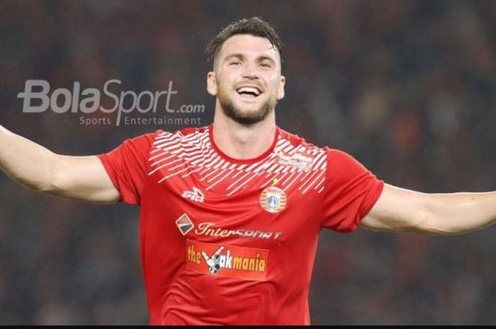 Striker Persija Jakarta, Marko Simic, merayakan gol ke gawang Bali United pada laga final Piala Pres