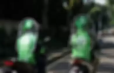 Ilustrasi mitra driver Gojek mengendarai sepeda motor.(Dok. Gojek)
