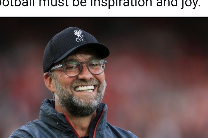 Juergen Klopp, pelatih Liverpool yang murah senyum. 