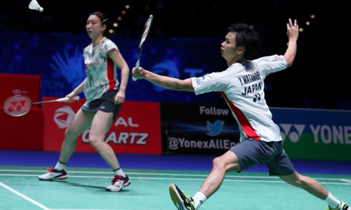 Yuta Watanabe (kanan)/Arisa Higashino saat tampil pada final All England Open 2018, di Birmingham Arena, London, Inggris, Minggu (18/3/2018).